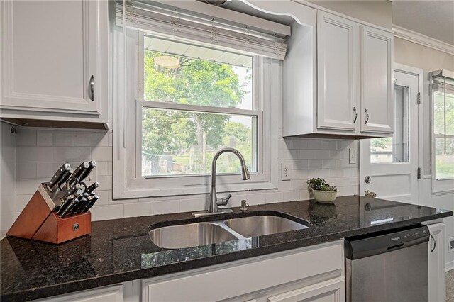 7135 Conser St, Overland Park, KS 66204 - kitchen with dishwasher, white cabinetry, backsplash, and crown molding