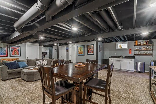 7135 Conser St, Overland Park, KS 66204 - carpeted dining room featuring bar with sink