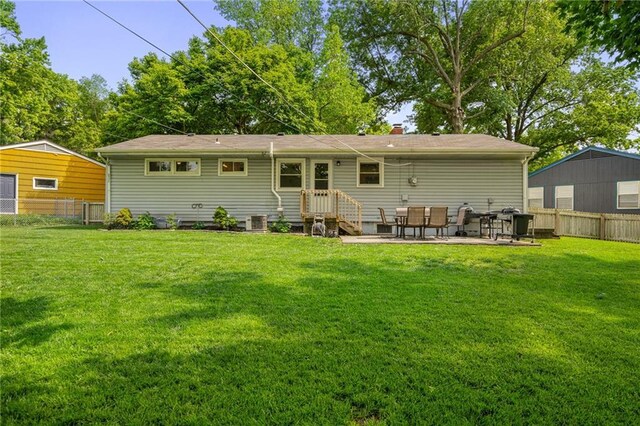 7135 Conser St, Overland Park, KS 66204 - rear view of house featuring a patio and a chimney
