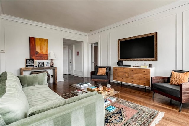 4618 Warwick Blvd Unit 7F, Kansas City, MO 64112 - living area featuring ornamental molding and wood finished floors