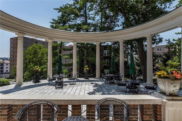 4618 Warwick Blvd Unit 7F, Kansas City, MO 64112 - view of patio with outdoor dining space