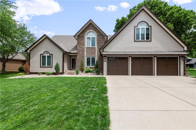 3917 SW Windjammer Ct, Lees Summit, MO 64082 - traditional home with driveway, a front yard, an attached garage, and a shingled roof