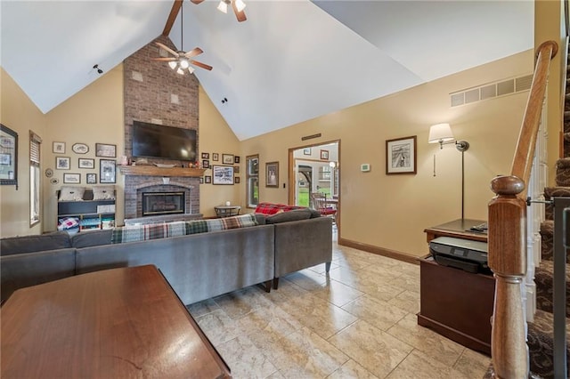 3917 SW Windjammer Ct, Lees Summit, MO 64082 - living room featuring ceiling fan, high vaulted ceiling, a fireplace, and baseboards
