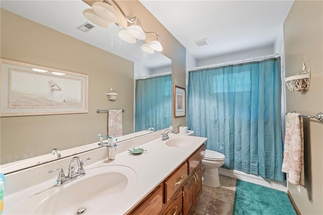 3917 SW Windjammer Ct, Lees Summit, MO 64082 - full bathroom with toilet, double vanity, and curtained shower