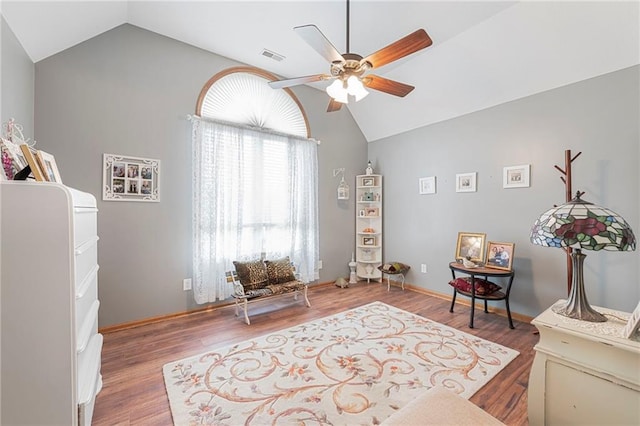3917 SW Windjammer Ct, Lees Summit, MO 64082 - living area with vaulted ceiling, ceiling fan, and wood finished floors