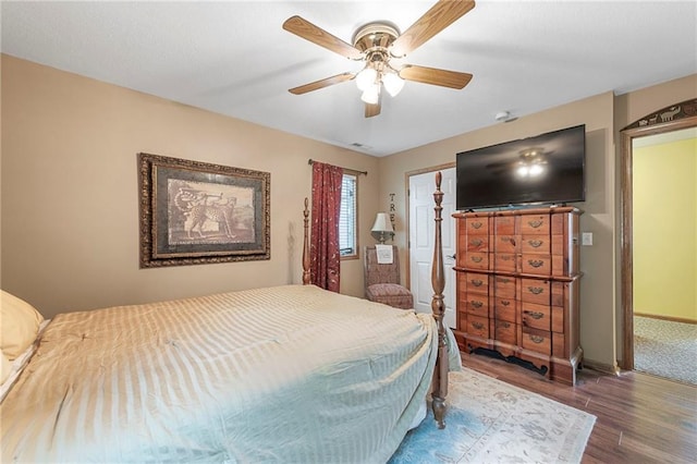 3917 SW Windjammer Ct, Lees Summit, MO 64082 - bedroom featuring wood finished floors, baseboards, and ceiling fan
