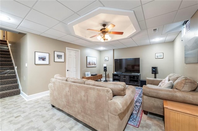 3917 SW Windjammer Ct, Lees Summit, MO 64082 - living area featuring stairway, a drop ceiling, ceiling fan, and baseboards