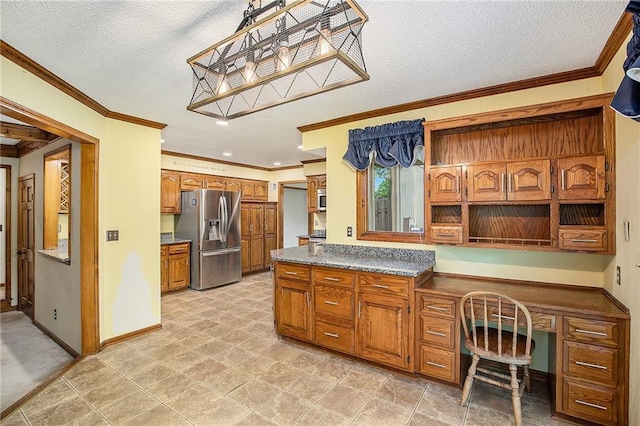 2409 NE 73rd Ter, Gladstone, MO 64118 - kitchen with stainless steel refrigerator with ice dispenser, a textured ceiling, brown cabinetry, ornamental molding, and dark countertops