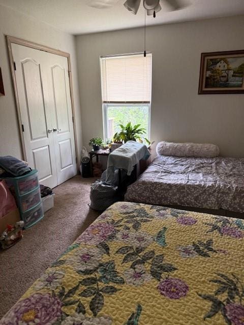 1235 Ashley Ln, Grain Valley, MO 64029 - carpeted bedroom featuring ceiling fan
