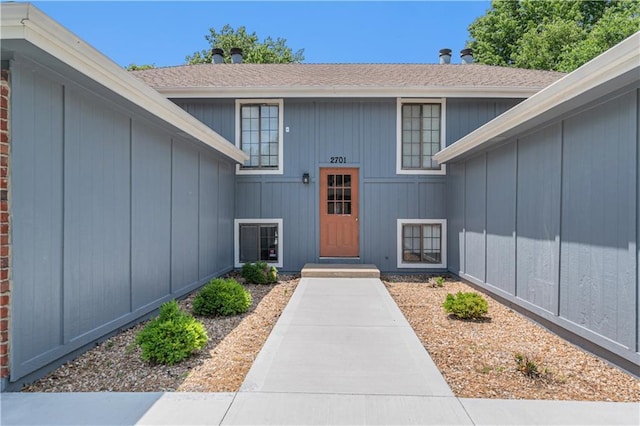 2701 NW 5th St, Blue Springs, MO 64014 - entrance to property featuring roof with shingles