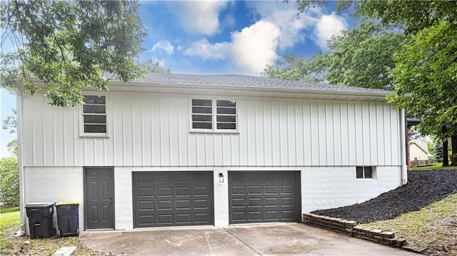 126 E Bridlespur Dr, Kansas City, MO 64114 - view of home's exterior with driveway and an attached garage