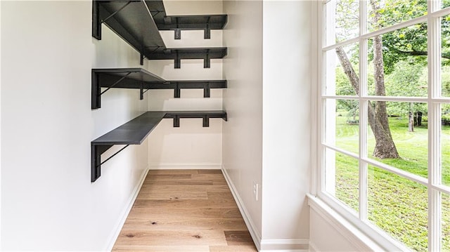 126 E Bridlespur Dr, Kansas City, MO 64114 - spacious closet featuring light wood-style flooring