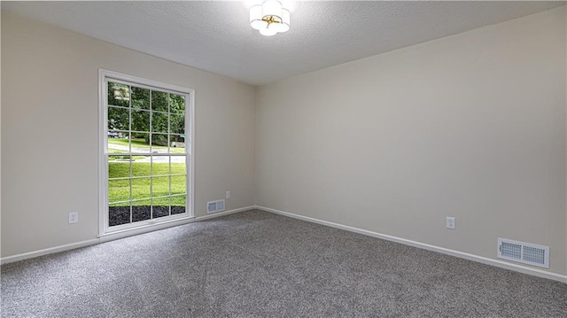 126 E Bridlespur Dr, Kansas City, MO 64114 - empty room with carpet flooring, baseboards, and a textured ceiling