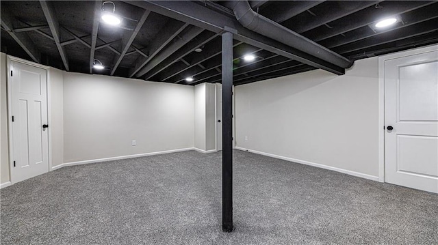 126 E Bridlespur Dr, Kansas City, MO 64114 - finished basement featuring carpet flooring and baseboards