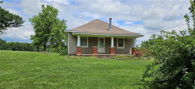 123 NW 1501st Rd, Holden, MO 64040 - view of front of home with covered porch and a front lawn