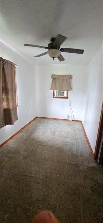 123 NW 1501st Rd, Holden, MO 64040 - carpeted spare room featuring a ceiling fan and baseboards