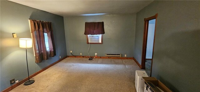 123 NW 1501st Rd, Holden, MO 64040 - unfurnished room featuring a baseboard radiator, carpet floors, and baseboards