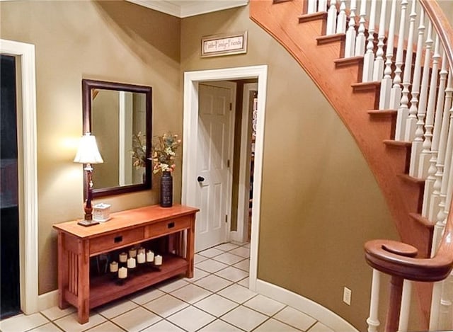 925 S Walnut St, Maryville, MO 64468 - stairway with tile patterned floors, crown molding, and baseboards