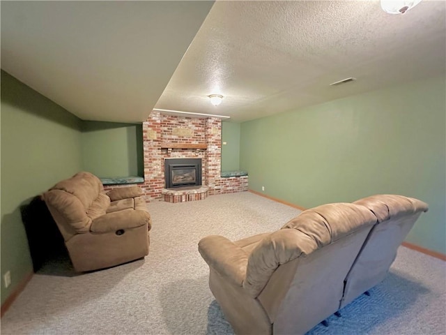 925 S Walnut St, Maryville, MO 64468 - living room featuring carpet flooring, a textured ceiling, baseboards, and a brick fireplace