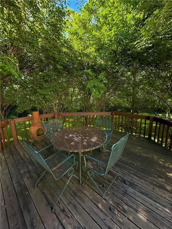 925 S Walnut St, Maryville, MO 64468 - deck featuring outdoor dining area