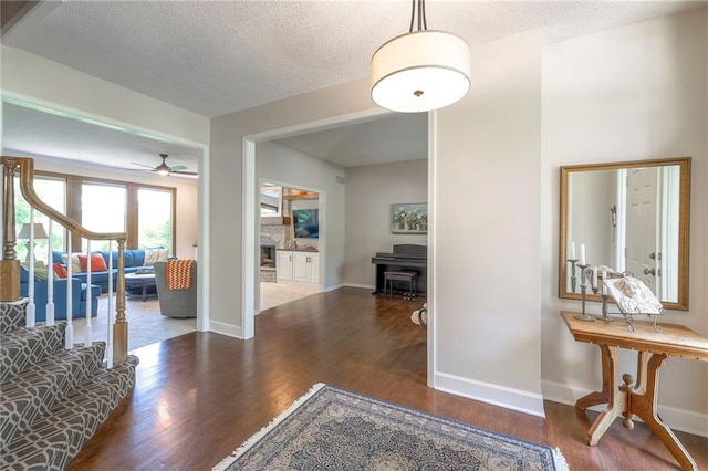 8355 Hallet St, Lenexa, KS 66215 - corridor with wood finished floors and a textured ceiling