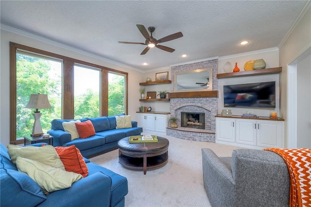 8355 Hallet St, Lenexa, KS 66215 - carpeted living room featuring a ceiling fan, crown molding, a textured ceiling, a fireplace, and recessed lighting