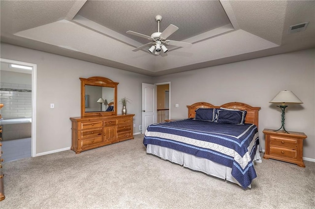 8355 Hallet St, Lenexa, KS 66215 - bedroom featuring a raised ceiling, carpet, a textured ceiling, ceiling fan, and ensuite bathroom