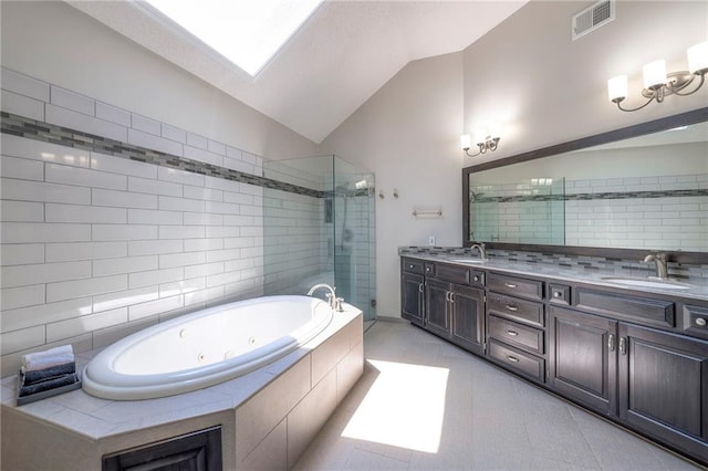8355 Hallet St, Lenexa, KS 66215 - bathroom with a shower stall, vaulted ceiling, double vanity, and a whirlpool tub