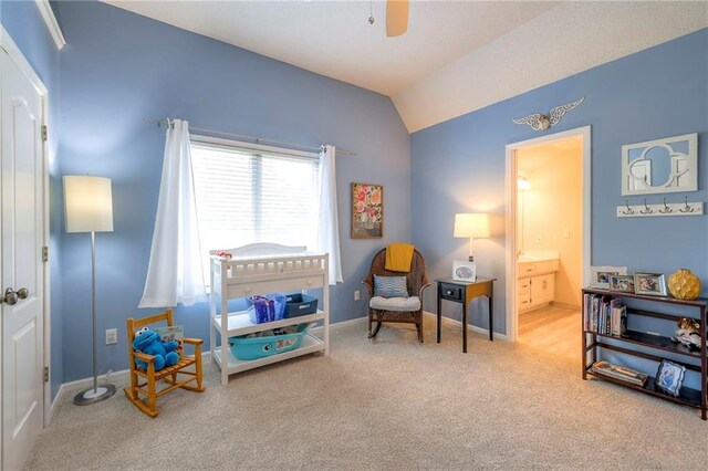 8355 Hallet St, Lenexa, KS 66215 - sitting room featuring carpet, ceiling fan, and vaulted ceiling