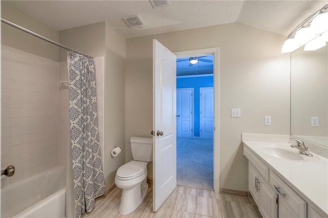8355 Hallet St, Lenexa, KS 66215 - bathroom with vanity, shower / bath combo, a textured ceiling, and lofted ceiling
