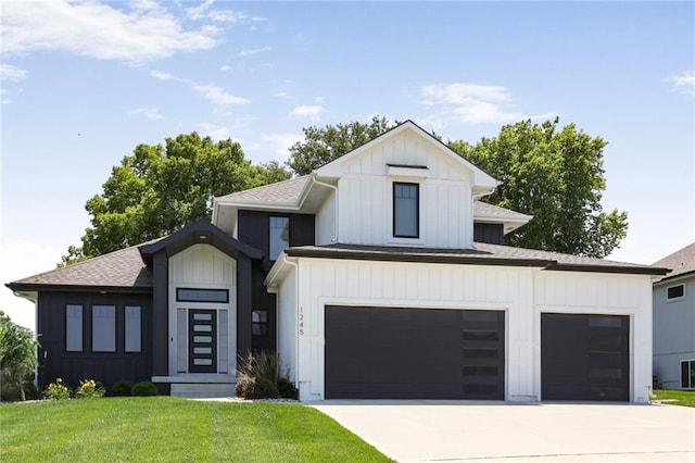 1245 NE Goshen Dr, Lees Summit, MO 64064 - view of front facade featuring concrete driveway, a shingled roof, a front yard, board and batten siding, and a garage