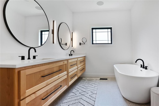1245 NE Goshen Dr, Lees Summit, MO 64064 - full bath with healthy amount of natural light, double vanity, and a soaking tub
