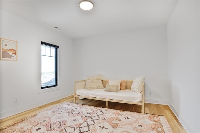 1245 NE Goshen Dr, Lees Summit, MO 64064 - living area featuring wood finished floors and baseboards