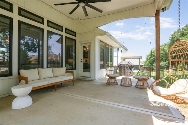 1245 NE Goshen Dr, Lees Summit, MO 64064 - view of patio with a ceiling fan, area for grilling, and an outdoor living space