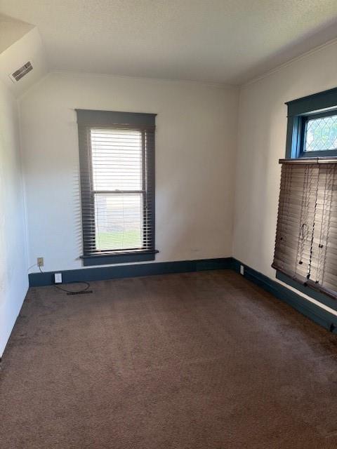 313 Shawnee St, Hiawatha, KS 66434 - carpeted spare room with baseboards