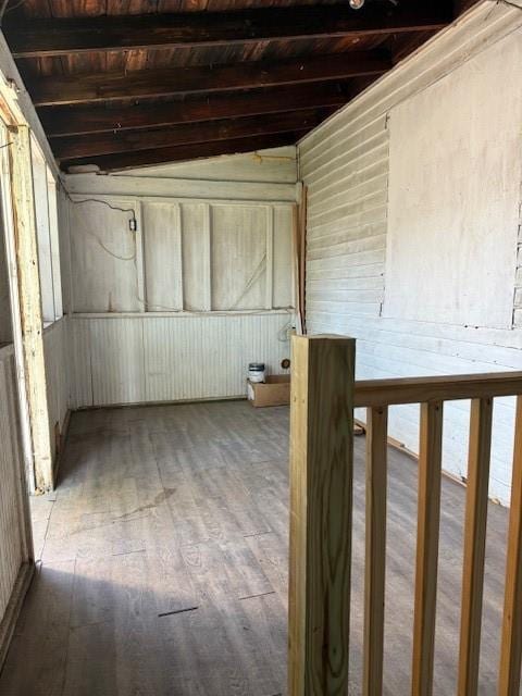 313 Shawnee St, Hiawatha, KS 66434 - below grade area with wood ceiling and wood finished floors
