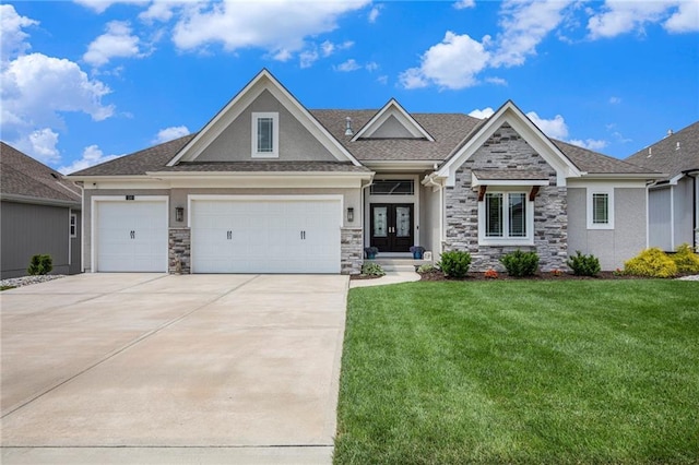 130 NW Ambersham Dr, Lees Summit, MO 64081 - view of front of home featuring stone siding, french doors, and a front yard