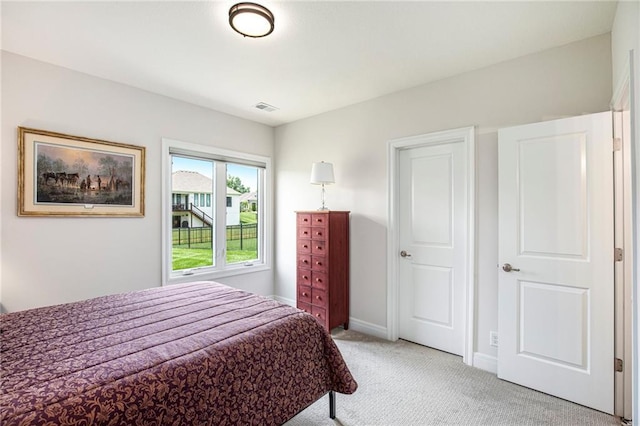 130 NW Ambersham Dr, Lees Summit, MO 64081 - bedroom featuring light colored carpet and baseboards