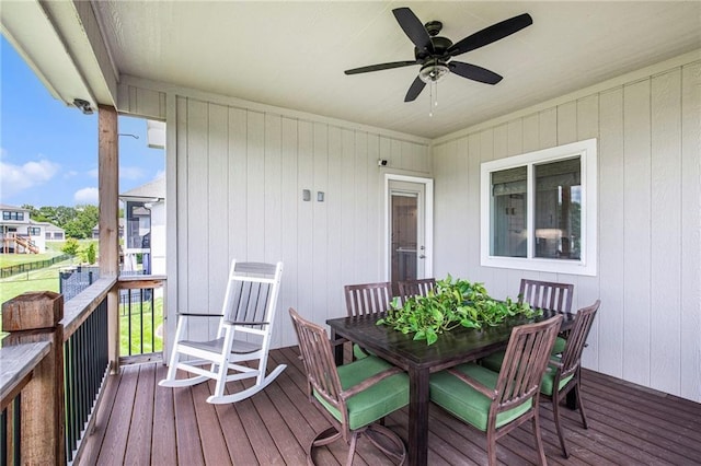 130 NW Ambersham Dr, Lees Summit, MO 64081 - wooden deck with ceiling fan and outdoor dining space