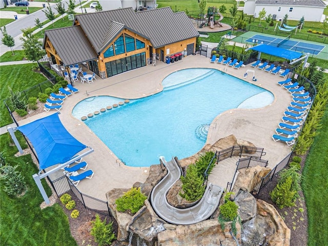 130 NW Ambersham Dr, Lees Summit, MO 64081 - community pool with a patio area