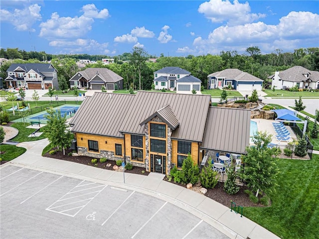 130 NW Ambersham Dr, Lees Summit, MO 64081 - view of building exterior with a residential view and uncovered parking