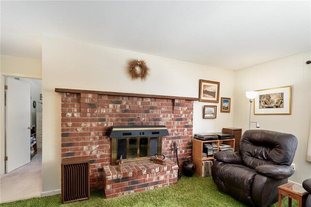9643 Y Rd, Meriden, KS 66512 - carpeted living room featuring a brick fireplace