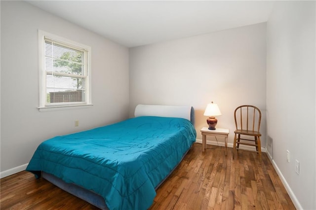 9643 Y Rd, Meriden, KS 66512 - bedroom featuring wood finished floors and baseboards