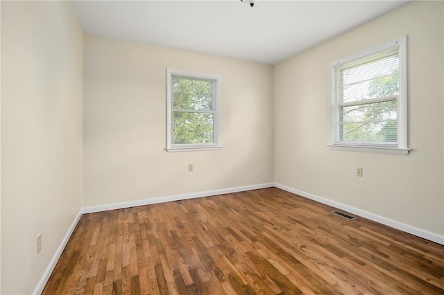 9643 Y Rd, Meriden, KS 66512 - empty room featuring baseboards and wood finished floors