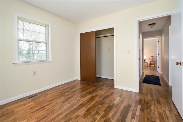 9643 Y Rd, Meriden, KS 66512 - unfurnished bedroom with wood finished floors and a closet
