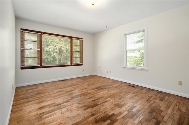 9643 Y Rd, Meriden, KS 66512 - empty room with wood finished floors and baseboards
