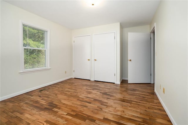 9643 Y Rd, Meriden, KS 66512 - unfurnished bedroom featuring wood finished floors