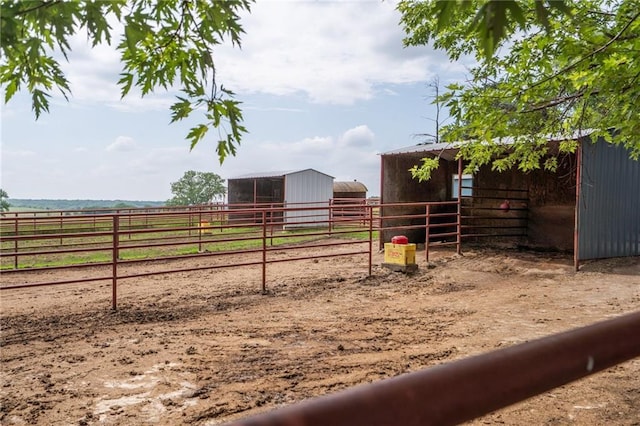 9643 Y Rd, Meriden, KS 66512 - view of yard with an exterior structure, an outbuilding, and a view of countryside