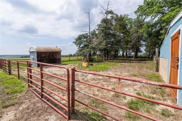 9643 Y Rd, Meriden, KS 66512 - gate with a rural view, an exterior structure, and an outdoor structure