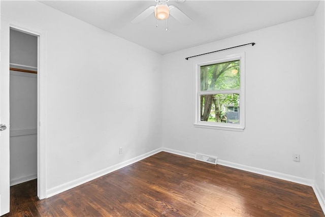 4510 E 113th St, Kansas City, MO 64137 - unfurnished bedroom featuring a closet, wood finished floors, and ceiling fan